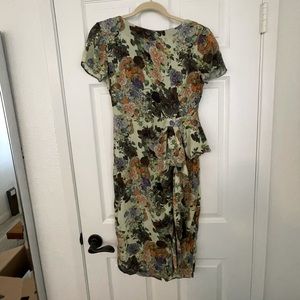 Flower print dress with fabric wave detail